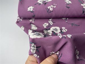 Fastvævet polyester med stræk - flot mørkelilla med blomster